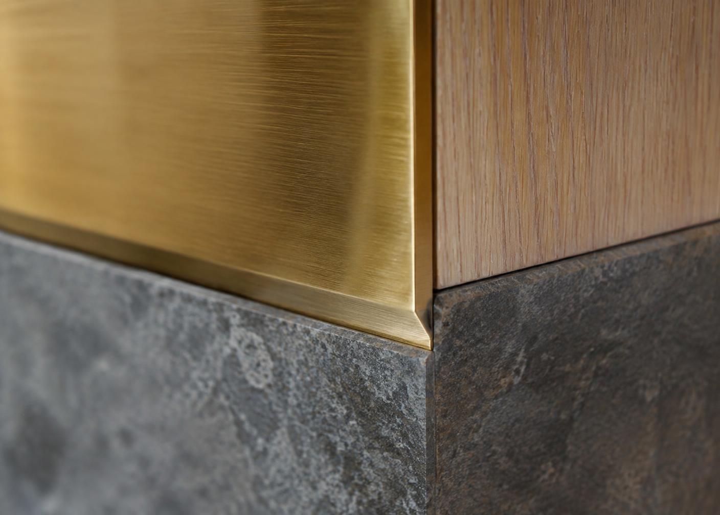 Close study of brass, stone and timber detail